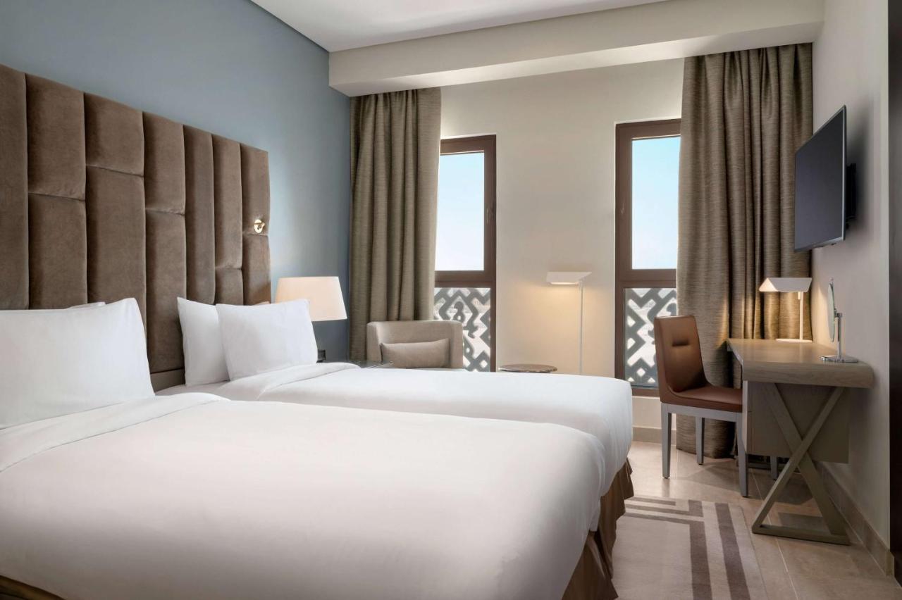 Appartamento Familiare con 3 Camere da Letto, Vista Mare e Accesso Spiaggia Privata