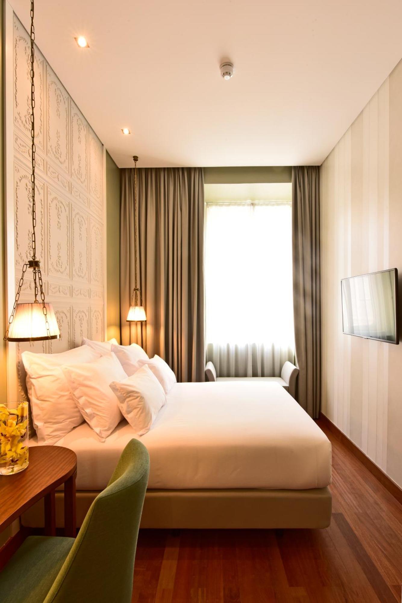 Camera Accogliente con Letto Queen Size