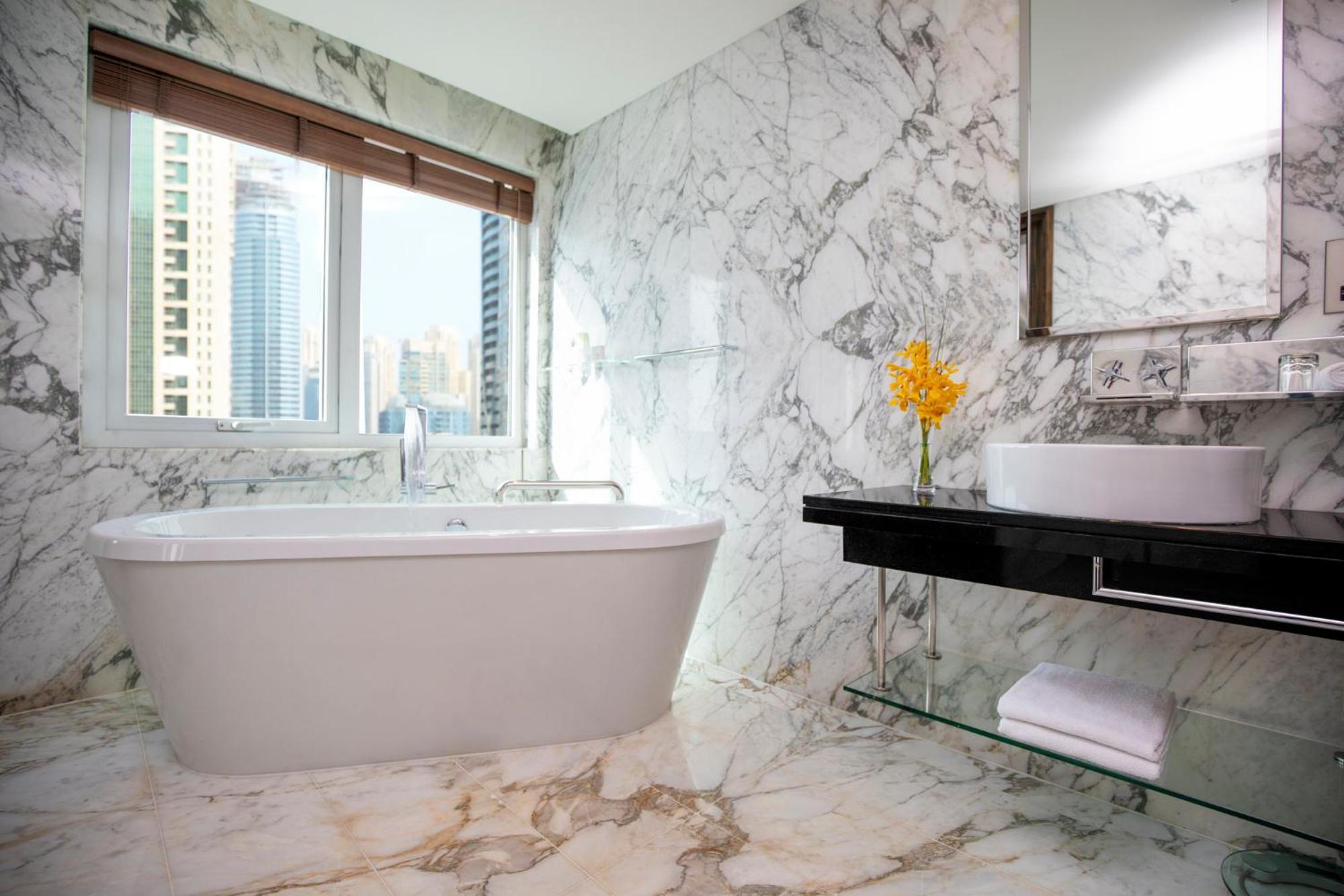 King Suite Includes daily access to Riva Beach Club shuttle service,1770871674:JPEG